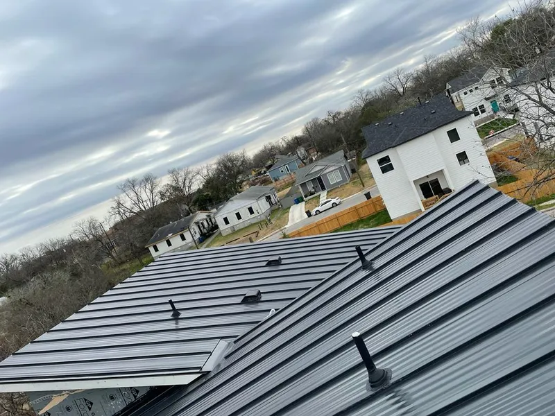 Standing seam metal roof panels with vents for Skylight Repair in Vidor